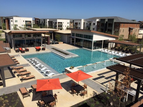 Green space is a major amenity for apartment dwellers. It should be large enough that residents can congregate and enjoy activities such as volleyball, tennis, swimming, or outdoor grilling.