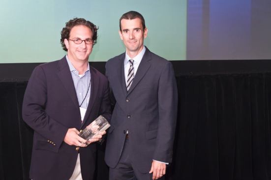Toby Bozzuto (left), president of Bozzuto Development Co., accepts the Editor’s Choice Award for The Fitzgerald from Multifamily Executive publisher Rob Britt. The Fitzgerald, an impressive and transformative mid-rise project in the heart of Baltimore, is a project that Bozzuto believes will redefine the future of multifamily housing in the Mid-Atlantic.