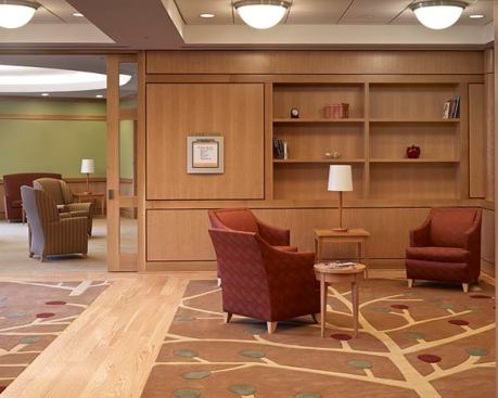 Situated on 88 acres of varied terrain, South Franklin Circle is a continuing-care retirement community with a variety of senior housing options that allow residents to age in place, including independent-living apartments, assisted-living facilities, townhomes, cottages, and garden duplexes, as well as 30 floor plans. Designed using New Urbanist principles, the project features a village square with an 80,000-square-foot community center that serves as a resident hub. The center offers several restaurants, fitness facilities with an indoor heated swimming pool, distance-learning classrooms, art and woodworking studios, guest suites, a bank, and other retail space. Only 40 percent of the site was developed, so that residents can enjoy 32 acres of woods and wetlands.