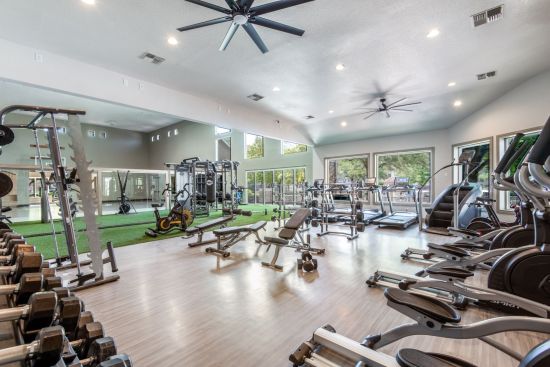 At the Halston on Frankford in North Dallas, Birchstone Residential recently converted a clubhouse area into a large, popular fitness center that connects to a pool and sauna, photo courtesy Birchstone Residential
