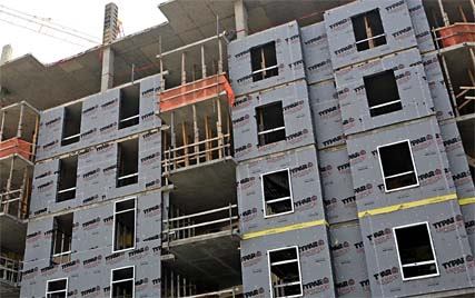 Typar's Metro-Wrap protects interiors from moisture and sun. Specifically engineered for the commercial construction environment, it offers a resilient water- and moldresistant barrier with tear strength almost five times that of the leading polymeric wraps. It also provides UV protection for up to a year.