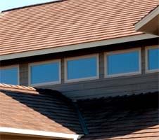 First-generation synthetic roof shingles could be detected a mile away, but today's faux offerings closely replicate authentic slate and shake. DaVinci Roofscapes' shingles are composed of a proprietary copolymer engineered specifically for long-term outdoor use complete with a UV package, thermal stabilizers, and fire retardants. The selection includes 19 earth tone colors and seven traditional blends, plus gray and black. The shingles' thickness-1/2-inch slate and 5/8-inch shake-deepens shadow lines and conveys the look of cedar shake or quarried stone. 
Cost:  $350 and up, per square 
ROI:  Unlike its natural counterpart, this roofing line requires limited maintenance and won-t curl, fade, crack, or absorb water.