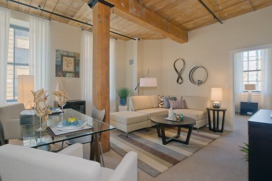 The two apartment buildings that make up Hayes at Railroad Square previously housed a mill, served as a shoe manufacturer, and later generated electricity. Working with the city of Haverhill, the Planning Office for Urban Affairs, a nonprofit affordable housing developer affiliated with the Archdiocese of Boston, adapted the 80,000-square-foot buildings into a mixed-income and mixed-use project. The $20 million reuse project offers 57 units: 52 affordable and five market-rate. Constructed in two phases in 1894 and 1911, the buildings feature architectural fa&ccedil;ades more commonly found on commercial structures. The buildings’ historic integrity was retained during renovations, which involved repairing the fa&ccedil;ade masonry and restoring the storefront wood framing and the original smokestack. The units are designed with a loft-style feel to take advantage of historic elements such as large windows, exposed wood beams, and decking. Amenities include a community room/caf&eacute;, indoor children’s play area, laundry room, and fitness center.