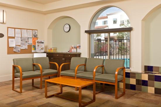 Wolff Waters Place, located in an upscale single-family neighborhood, houses low-income families with children. The 22-building development, which was awarded LEED Gold certification, offers units ranging from 650 to 1,376 square feet. Designed in the Spanish Mission Revival style with smooth stucco buildings, red tile roofs, and Spanish tile accents, the project includes an underground podium parking structure. In an effort to create a “street” environment, the design team incorporated sidewalks, plazas, crossings, promenades, play areas, courtyards, and porches. Community amenities include a day-care center, a computer lab, meeting rooms, a spa area, tot lots, laundry facilities, and a basketball court. The $74.1 million project, which has a lengthy waiting list, received $33.8 million in 4 percent low-income housing tax credits, along with $30 million from the La Quinta Redevelopment Agency.