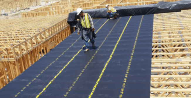 The system’s thin, flexible 1/8-inch-thick polymer sheets are stapled or screwed to studs before drywall.