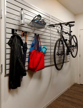 KTGY integrated gear walls into residents' units at its Washington, D.C., Ava H Street project. The walls can be configured to hang a bicycle or other objects of the tenant's choosing.