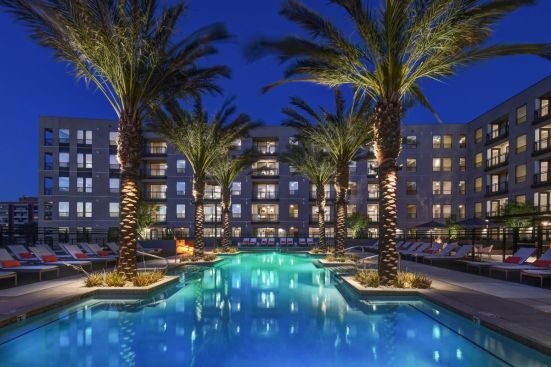 AVE Phoenix Terra in Arizona boasts a palm tree-lined sundeck with a sparkling pool and hot tub, two large courtyards, and more.