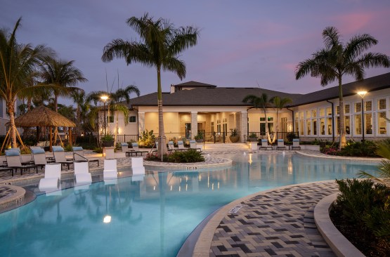 Bainbridge Palmore, a mid-rise community in Sarasota, Florida, is surrounded by ample parking and offers private garages for some units.