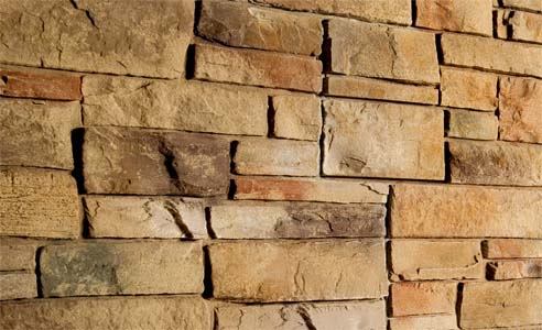 Get the look and feel of natural stone without the excessive labor involved with typical stone installations. BellaStone, made of real stone aggregate and pigment infused into a polymer base, can be applied directly to the wall and is available in two shades-earthy Tuscan and gray Torino. A large number of patterns means that virtually no stone repeats itself for a realistic effect.
Cost:  $18 to $20 per square foot, installed 
ROI:  The installed cost of BellaStone is 50 percent less than true quarried stone and 20 percent less than manufactured stone. Plus, the product weighs five times less than manufactured cement stone, so it can be mounted directly to the wall by a siding contractor (no need for a mason) without costly preparation or special installation materials. Unlike real stone, the product offers sound abatement and a built-in moisture management system.