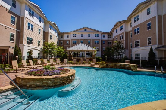 Residents of Campus Crossings' Briarcliff apartments in Atlanta enjoy a large outdoor pool.&nbsp;