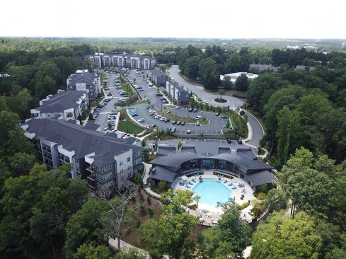 Atlanta real estate developer Brand Properties assembled several parcels within Technology Park, a sprawling development initiated in the 1970s with numerous low-rise brick office buildings.  Two buildings were demolished, and Brand constructed the 296-unit Echo Lakeside apartments.