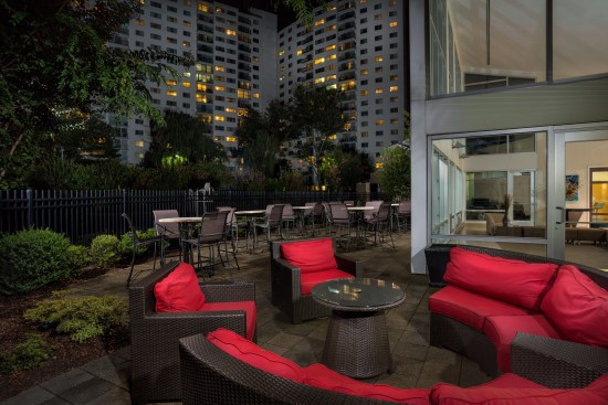 Enclave Silver Spring, in Silver Spring, Md. On the property's website, ROSS touts the cross-generational appeal of the community, whose amenities, like this patio area, it says "rival [those of] a luxury hotel" and whose apartment features are "worthy of a big city penthouse."
