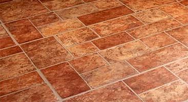 Ceramico planked tiles offer the look of tile with the ease of laminate. Each flooring plank combines four tiles with a click together joinery system for easy installation. The manufacturer recently introduced four new colors: Padua, Triana, Salerno, and Veneto. The surface is textured to help replicate the look of real tile flooring. 
Cost: $4.49 to $4.99 per square foot 
ROI: In addition to being less expensive than real ceramic, laminate flooring is also resistant to scratches, spills, and pressure from high heels and falling objects. Moderna's line is perfect for a quick make-ready; the glueless installation system means you can walk on the floor immediately after it's in place.