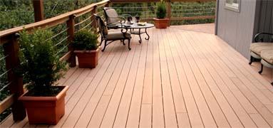 No one likes stepping on a burning hot deck in the middle of summer. Oasis composite decking is coated with a cool-touch formulation to keep decks comfortable even in direct sunlight. The planks, available in a range of popular wood stain colors including Carolina pine, New England grey, Pacific redwood, and teak, feature slight color variations that are enhanced over time by the natural effects of sun, wind, rain, and wear to create a realistic weathered look.
Cost:  $2.30 to $2.50 per lineal foot for 2-inch-by-6-inch planks 
ROI:  Earlier this year, the manufacturer introduced a new hidden fastener system for easy installation and a strong hold. The system, which uses an interlocking plank and biscuit design that grips and automatically spaces each board, uses half the fasteners of conventional methods and reduces installation time by as much as 30 percent. Like other composites, Oasis won-t rot, splinter, or crack.