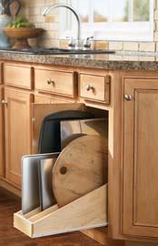 Maximize storage space with Aristokraft's base and roll-out tray divider, which separates and protects pans and ceramic surfaces from damage. The tray's removable dividers offer flexibility, and the product can be used for both left- and right-opening cabinet doors.