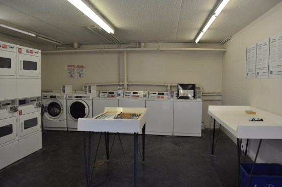 The same common-area laundry room before its renovation.