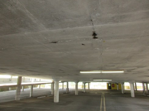 Apartment garages, whether made with structural steel or reinforced concrete, are susceptible to deterioration over time.