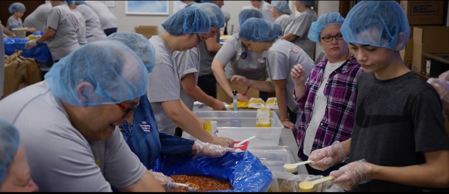 Glick team members and families give back to their community though Glick Cares. Credit: Gene B. Glick Company