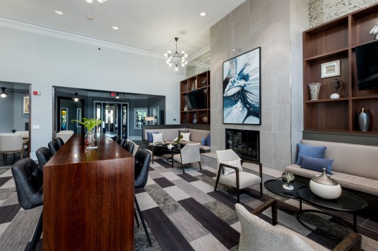 The leasing office at JVM Realty Corp.'s Aventine at Oakhurst North in Aurora, Ill., post-renovation (above). When JVM upgrades its multifamily residential units, the developer allows them to be offline for 16 days.