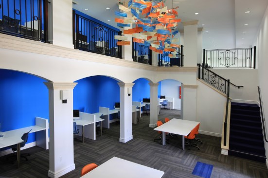 Lorenzo's study areas feature brightly colored walls and furnishings and desks reminiscent of library carrels.