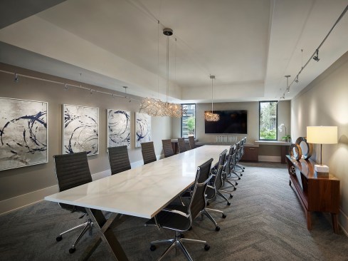 At AVE in King of Prussia, PA, residents have access to an executive conference room featuring an 82” TV with Apple TV for Airplay, an RTI control panel and a Yealink conference phone.
