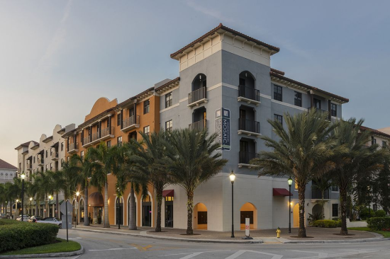 Mosaic at Miramar Town Center in Miramar, Florida, offers one-, two-, and three-bedroom apartment or townhome floor plans.