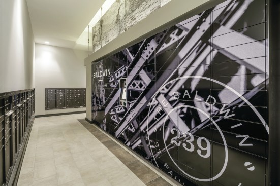 To make package lockers and mail rooms more inviting, The NRP Group incorporates art into the amenity’s design.