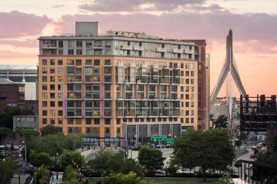 Built atop a triangular-shaped lot, the building is right in the heart of downtown historic Boston, near both its North and West End neighborhoods. Also close by are the Financial District, the Charles River, and a bike path. The building sits atop the North (rail) Station and the Central Artery/Tunnel, part of Boston's "Big Dig" construction project, which took 15 years to complete, from 1991 to 2006.