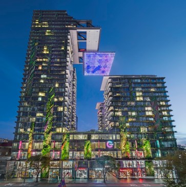 At night, 320 reflectors turn into an LED light show by artist Yann Kersalé. Image courtesy of Frasers Property Australia and Sekisui House Australia