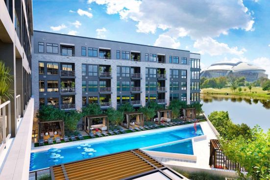 The pool at One Rangers Way with views of AT&T Stadium.