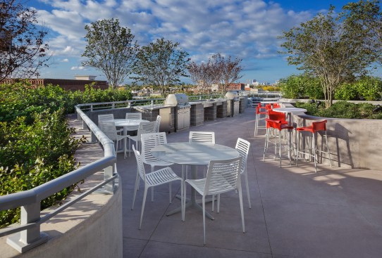 outdoor grills, outdoor furniture, concrete decking, concrete rooftop