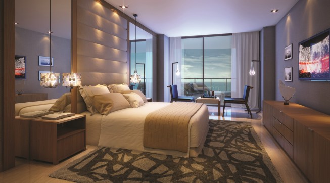 Earth tones are part of the design at Sabbia Beach to complement the natural backdrop of sand, beach grass, and shrubs. Light-green glass in each unit enhances the color of the ocean.