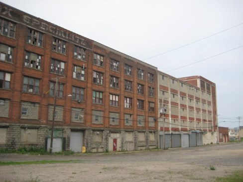 Before: The building was constructed in1901 for a paper-box manufacturer. The structure was added on to through the years, then occupied by a baseball-cap maker.