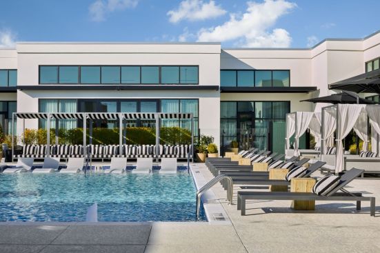 The rooftop pool at Sentral West Midtown at Star Metals gives guests and residents a slice resort-style living with views of the Atlanta skyline