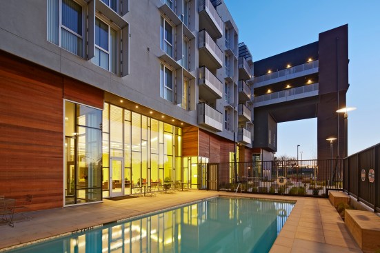 Station Center Family Housing, in Union City, Calif., features amenities appealing to both boomers and their grandchildren, including swimming pools (above) and playgrounds (below).
