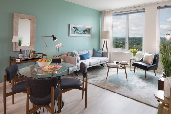 The architects designed The Pearl's units with neutral tones and crisp whites, as well as metal balcony railings, to reflect a classic modern aesthetic rather than anything trendy.