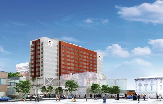 A rendering of Homewood 

Suites by Hilton from its planning stages. The project went through several iterations and architects 

before this plan was chosen, due 

to tight constraints on the development site.

