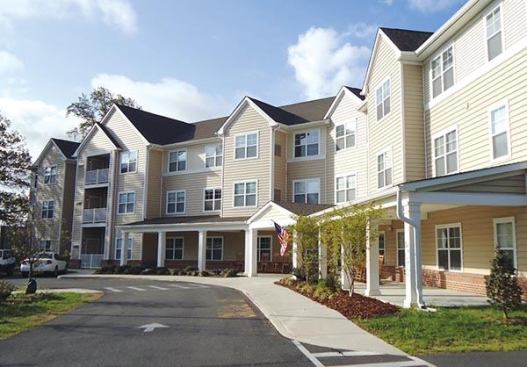 GREEN MODELS: Facing page: Homes for America’s Shiloh House, a 30-unit seniors community in Hurlock, Md., uses wind power to offset its electricity usage by 10 percent to 20 percent.