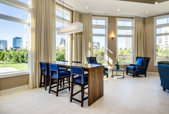 The indoor common area embodies a nautical vibe for residents to make the most of this waterfront property. 