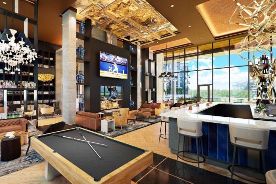 The club lounge with a full-service bar at One Rangers Way.